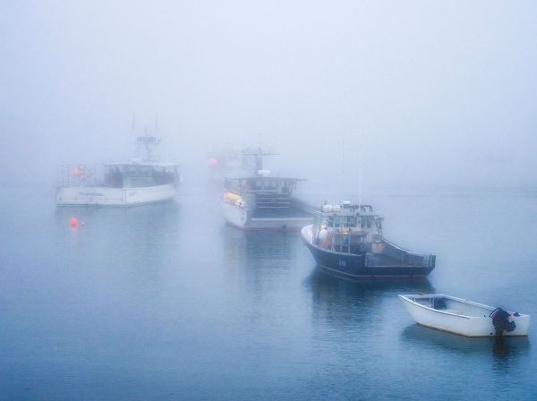 Maine Fishing boats in the harbor with fog